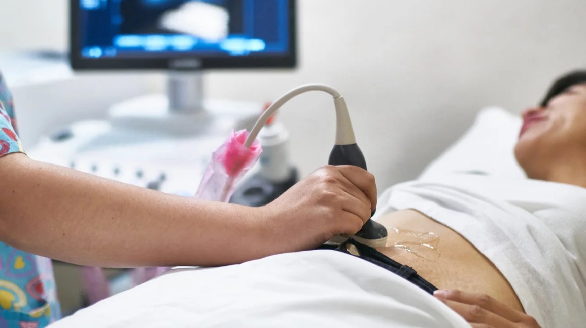 Doctor performing ultrasound